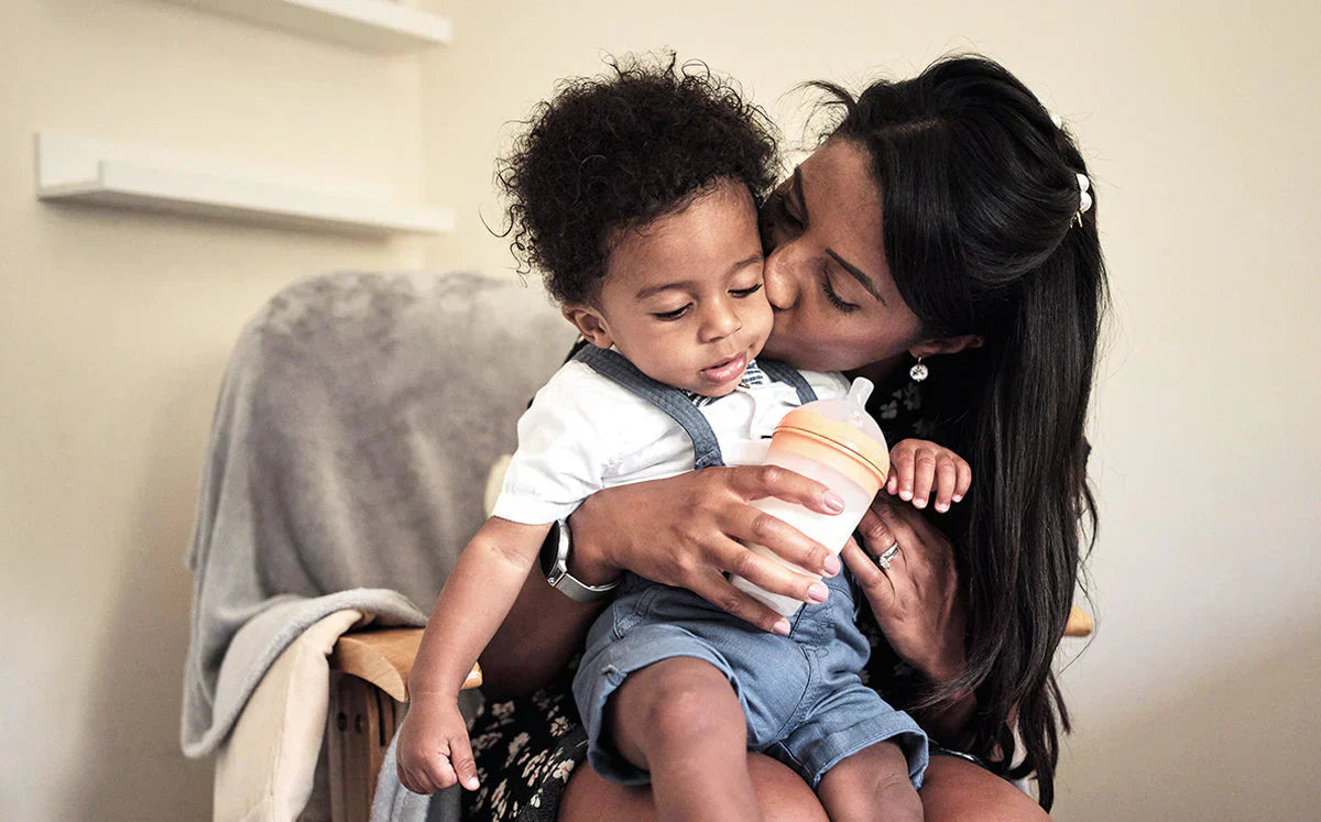 Mothers Happy Feeding Baby with BORRN Silicone Bottle